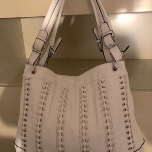 A cream Weekender tote bag